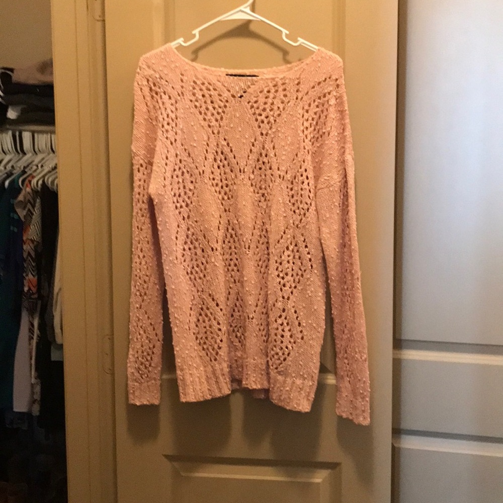 Cut out warm knitted sweater
